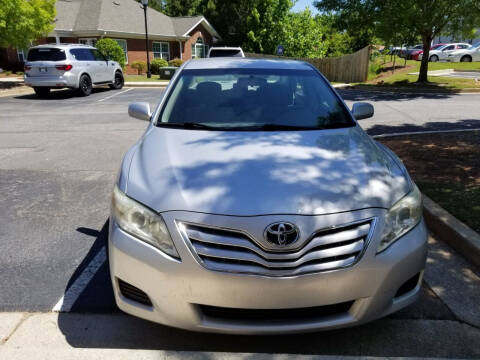 2011 Toyota Camry for sale at ATLANTA MOTORS in Suwanee GA