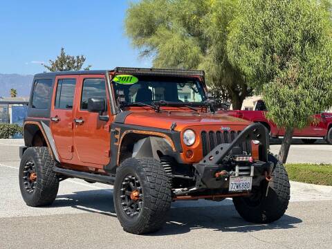 2011 Jeep Wrangler Unlimited for sale at Esquivel Auto Depot in Rialto CA