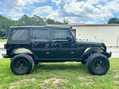 2015 Jeep Wrangler Unlimited for sale at Showtime Rides in Inverness FL