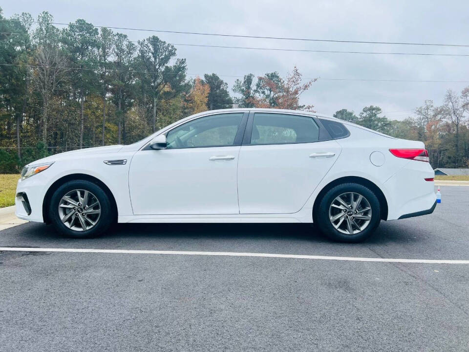 2019 Kia Optima for sale at Bluegate Motors LLC in Garner, NC