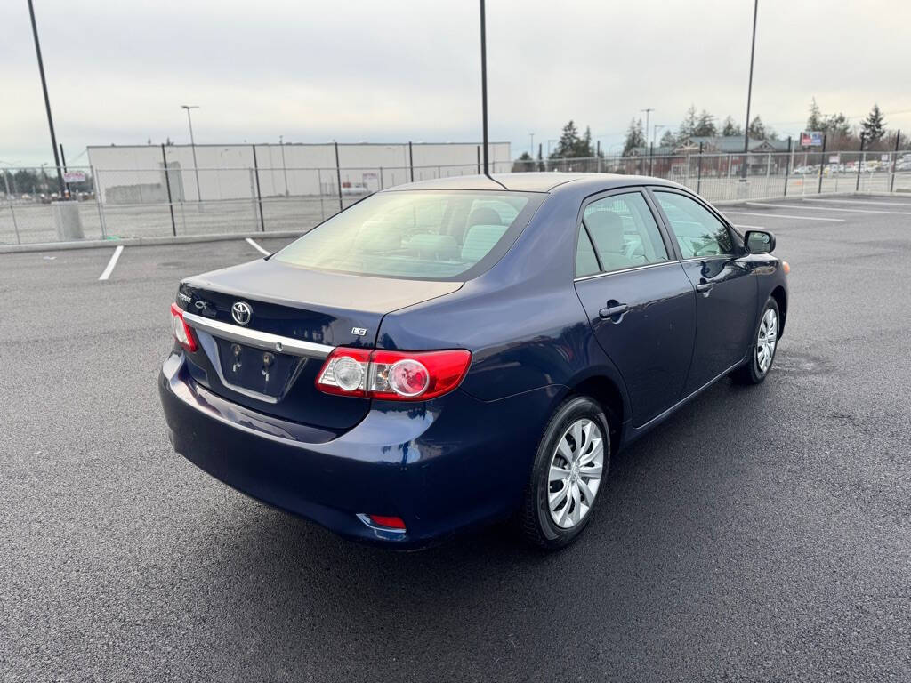 2013 Toyota Corolla for sale at The Price King Auto in LAKEWOOD, WA