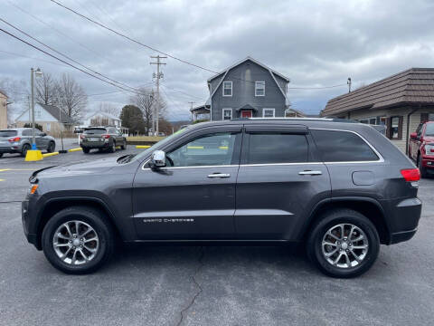 2014 Jeep Grand Cherokee for sale at MAGNUM MOTORS in Reedsville PA