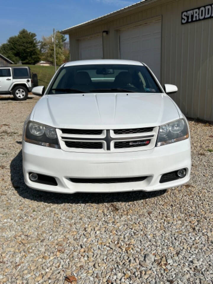 2014 Dodge Avenger for sale at STRODES AUTO GROUP LLP in Malta, OH