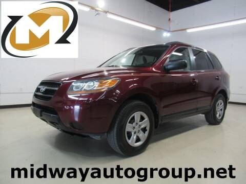 2009 Hyundai Santa Fe for sale at Midway Auto Group in Addison TX