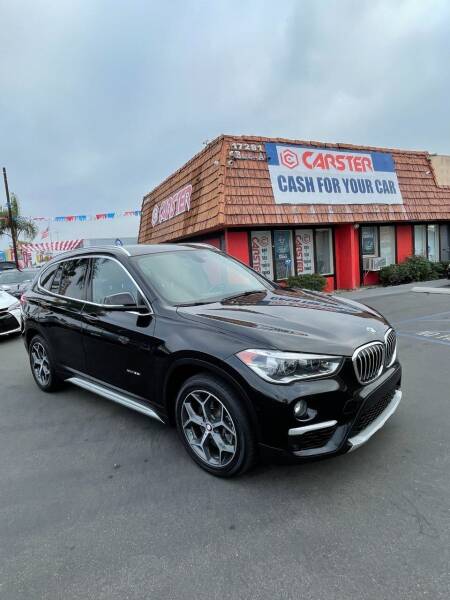 2017 BMW X1 for sale at CARSTER in Huntington Beach CA