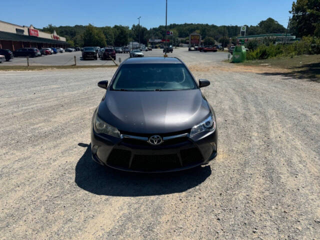 2016 Toyota Camry for sale at Guadalupe Auto Sales, LLC. in Jemison, AL