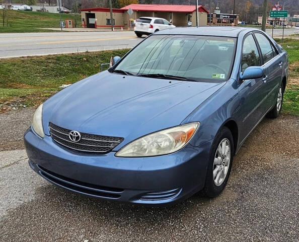 2003 Toyota Camry for sale at Art's Used Cars in Winfield, WV