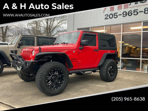 2015 Jeep Wrangler for sale at A & H Auto Sales in Clanton AL