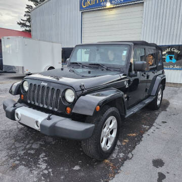 2013 Jeep Wrangler Unlimited for sale at Alex Bay Rental Car and Truck Sales in Alexandria Bay NY