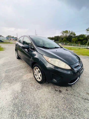 2011 Ford Fiesta for sale at CARNUGO in Lakeland FL