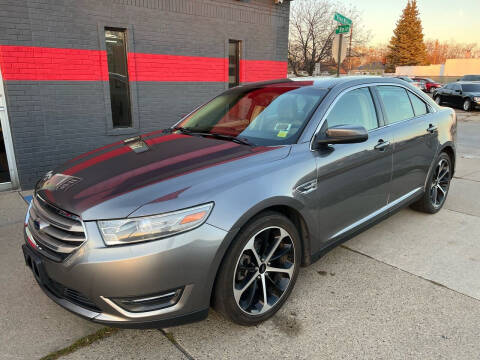 2014 Ford Taurus for sale at Suburban Auto Wholesale LLC in Eastpointe MI