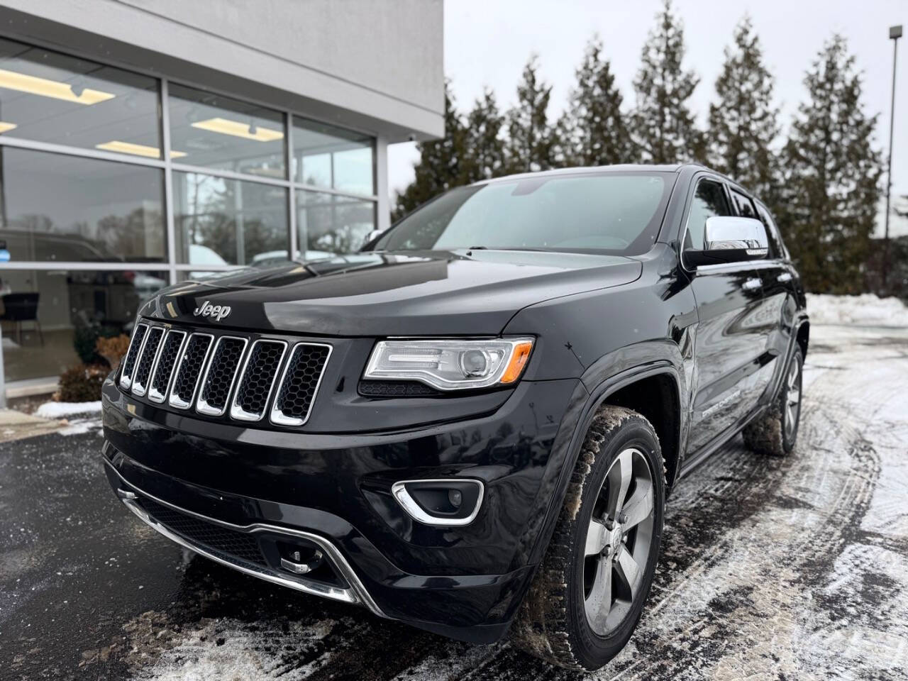 2015 Jeep Grand Cherokee for sale at Opus Motorcars in Utica, MI