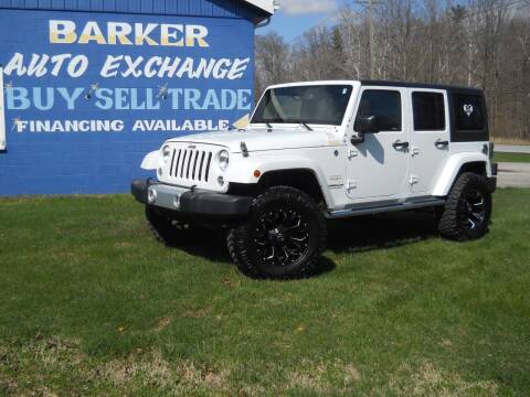 2015 Jeep Wrangler Unlimited for sale at BARKER AUTO EXCHANGE in Spencer IN