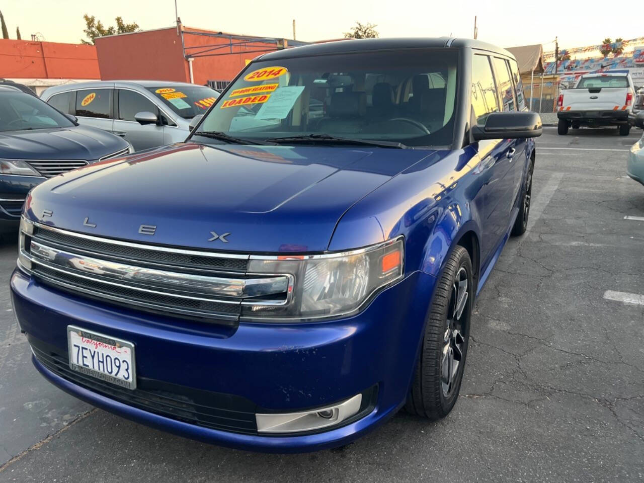 2014 Ford Flex for sale at Unique Auto Sales, Inc. in Bell, CA