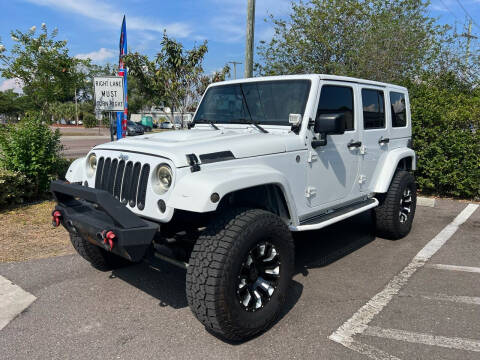 2014 Jeep Wrangler Unlimited for sale at Bay City Autosales in Tampa FL