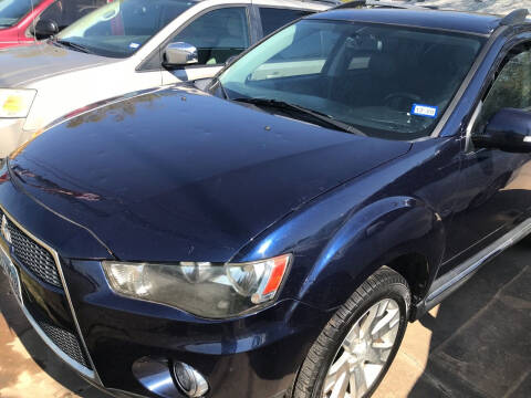 2012 Mitsubishi Outlander for sale at Simmons Auto Sales in Denison TX