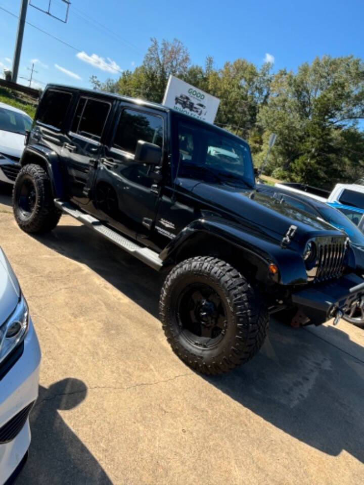 2013 Jeep Wrangler Unlimited for sale at Good Cars and Trucks Wholesale, LLC in Crystal Springs, MS