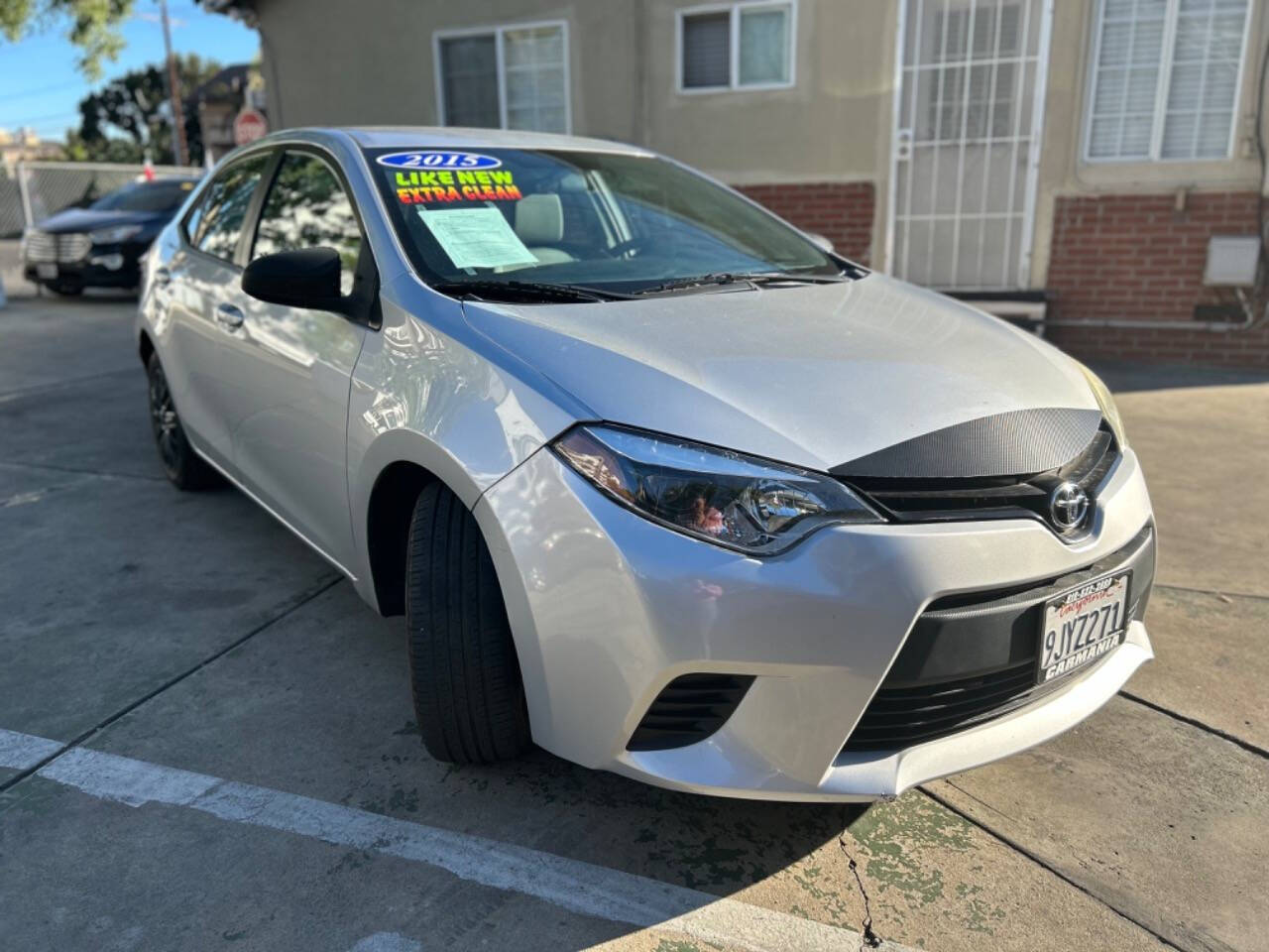 2015 Toyota Corolla for sale at Carmania in Panorama City, CA