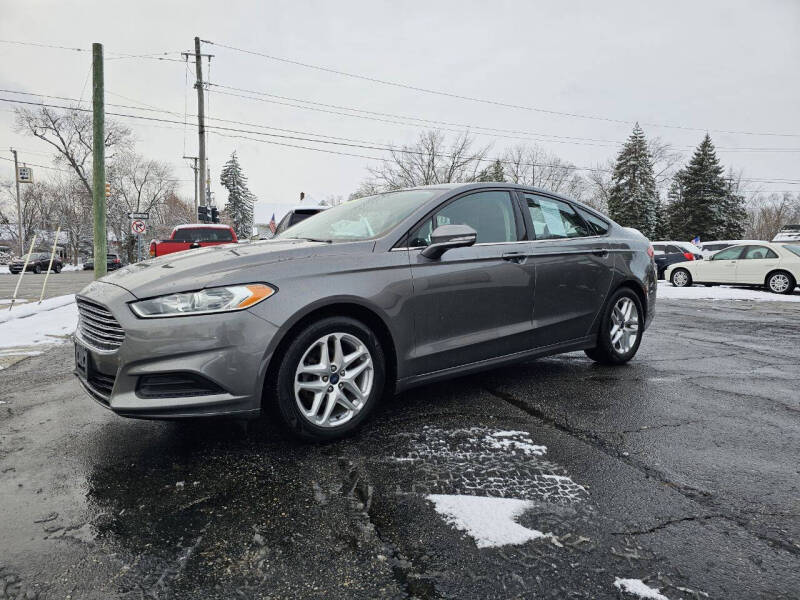 2013 Ford Fusion for sale at DALE'S AUTO INC in Mount Clemens MI