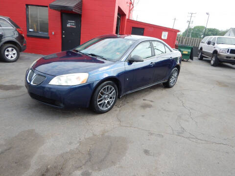 2009 Pontiac G6 for sale at MASTERS AUTO SALES in Roseville MI