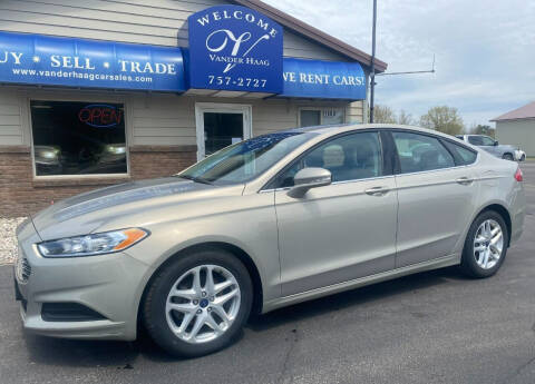 2015 Ford Fusion for sale at VanderHaag Car Sales LLC in Scottville MI