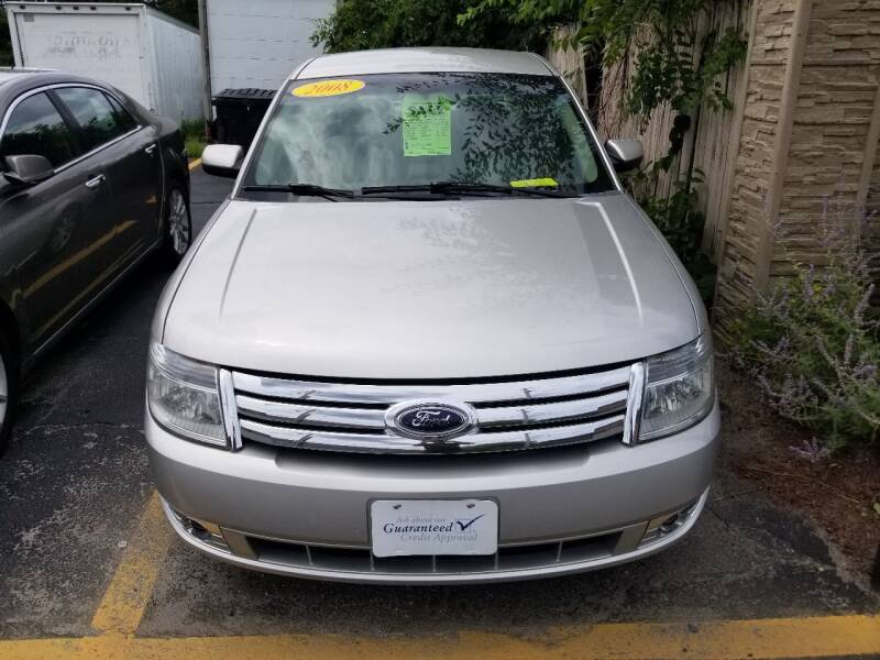 2008 Ford Taurus for sale at Howe's Auto Sales in Lowell MA