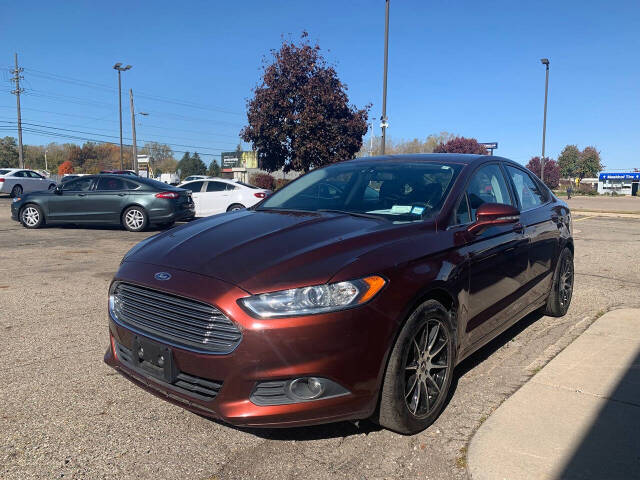 2016 Ford Fusion for sale at Cars On Demand LLC in Lansing, MI