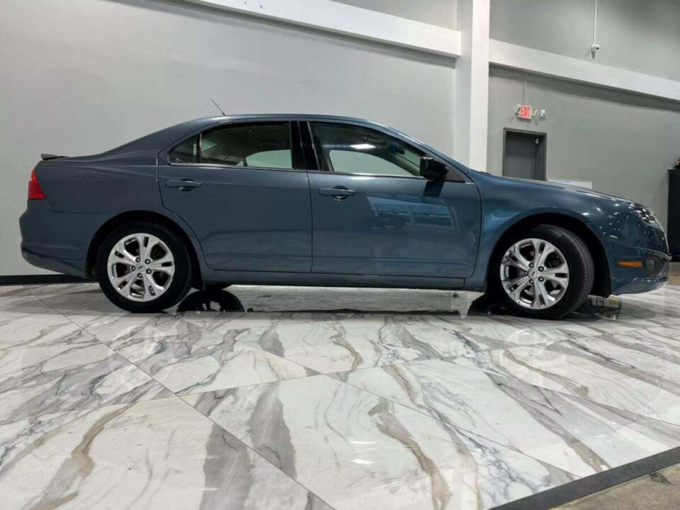 2012 Ford Fusion for sale at IMD MOTORS, INC in Dallas, TX