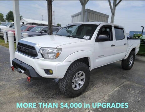 2015 Toyota Tacoma for sale at CTCG AUTOMOTIVE in South Amboy NJ