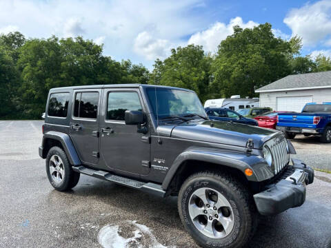 2016 Jeep Wrangler Unlimited for sale at Deals on Wheels Auto Sales in Scottville MI