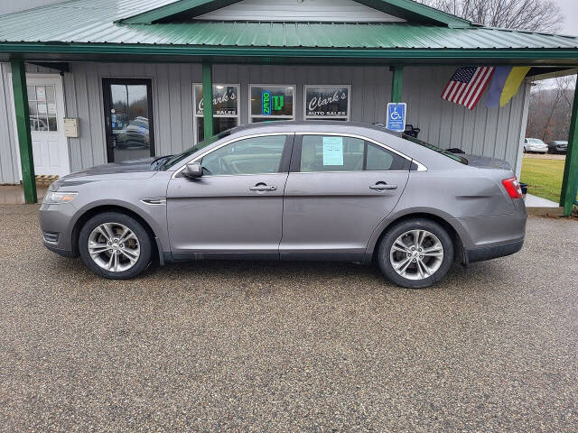 2014 Ford Taurus for sale at Clarks Auto Sales Inc in Lakeview, MI