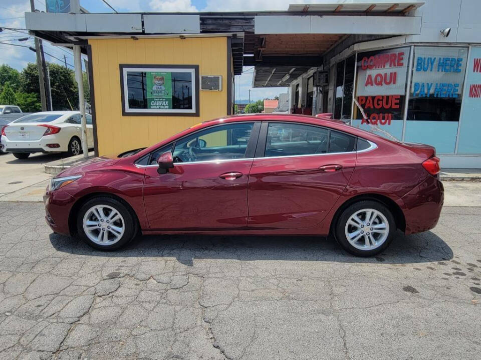 2016 Chevrolet Cruze for sale at DAGO'S AUTO SALES LLC in Dalton, GA