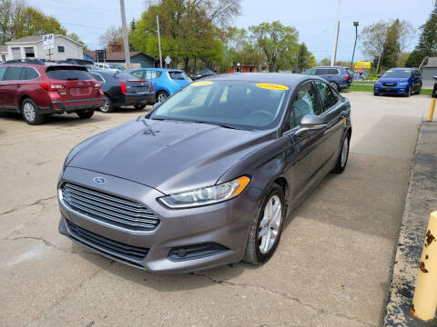 2014 Ford Fusion for sale at Clare Auto Sales, Inc. in Clare MI