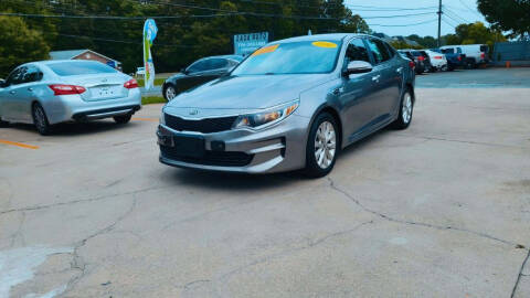 2016 Kia Optima for sale at DADA AUTO INC in Monroe NC