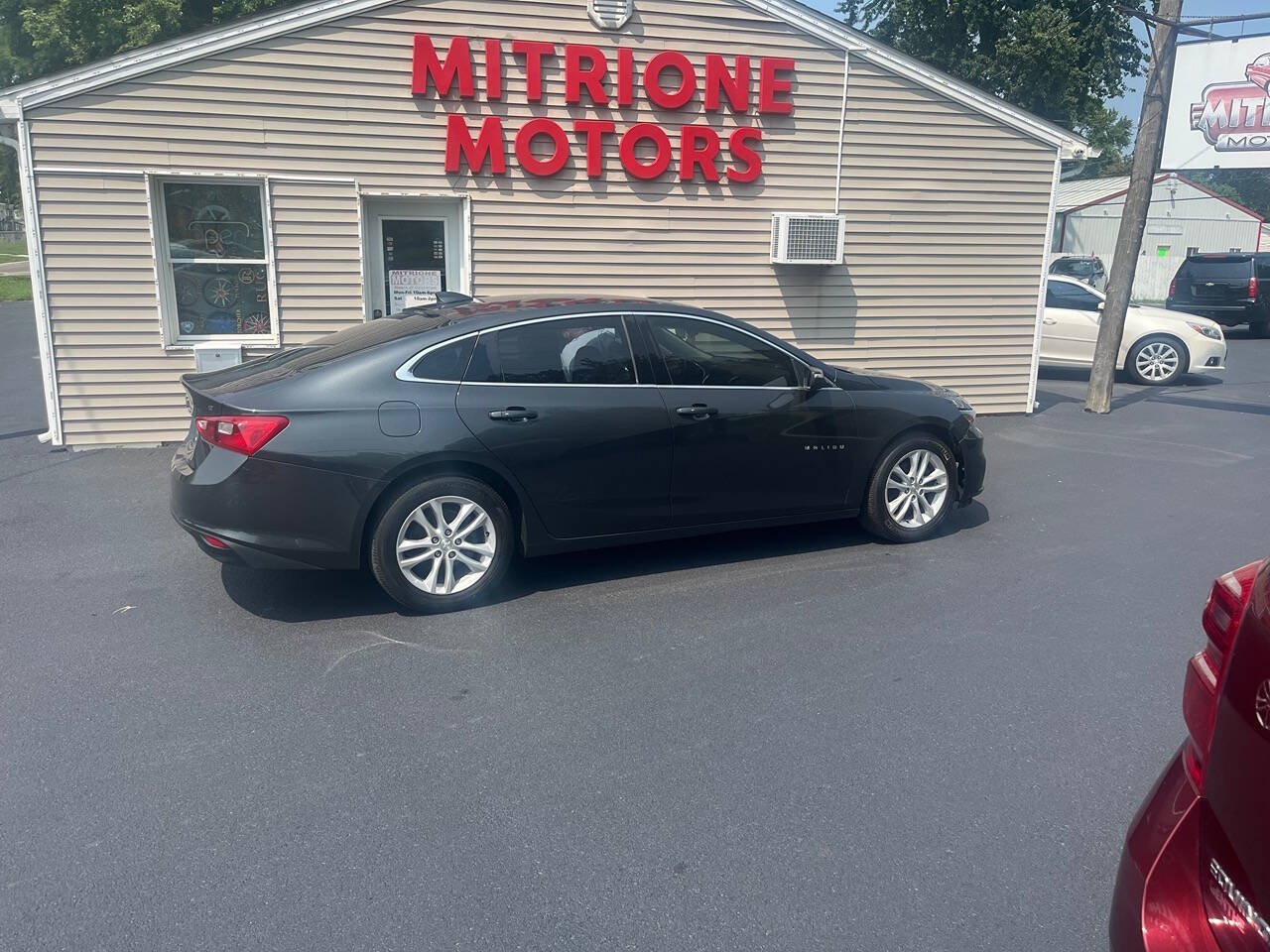 2017 Chevrolet Malibu for sale at Mitrione Motors in Springfield, IL