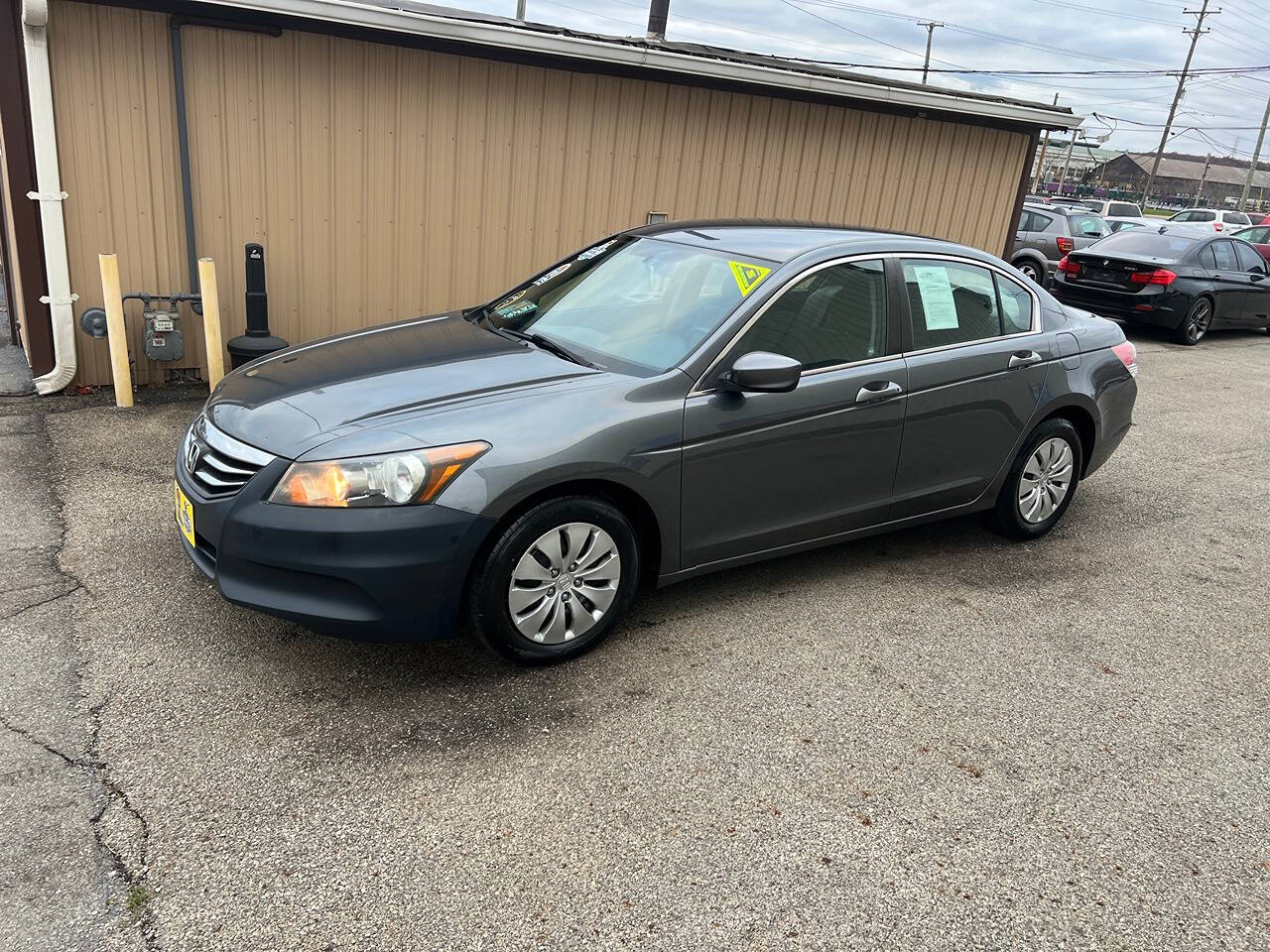 2011 Honda Accord for sale at BNM AUTO GROUP in GIRARD, OH