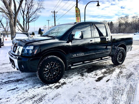 2011 Nissan Titan for sale at Premier Motors LLC in Crystal MN