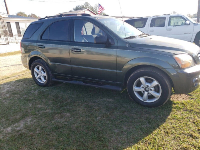 2007 Kia Sorento for sale at Albany Auto Center in Albany GA