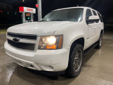 2011 Chevrolet Tahoe for sale at BELOW BOOK AUTO SALES in Idaho Falls ID