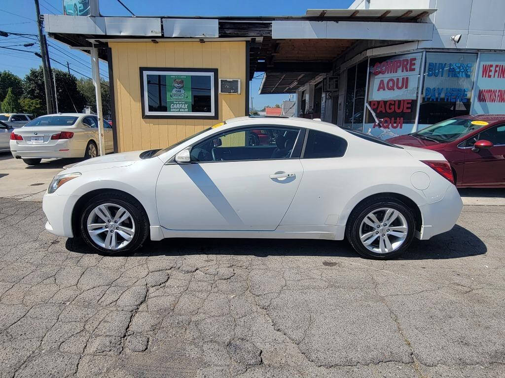 2012 Nissan Altima for sale at DAGO'S AUTO SALES LLC in Dalton, GA