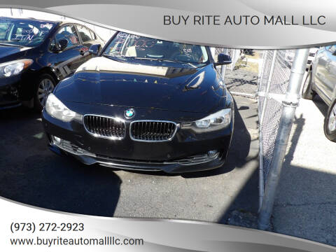2014 BMW 3 Series for sale at BUY RITE AUTO MALL LLC in Garfield NJ