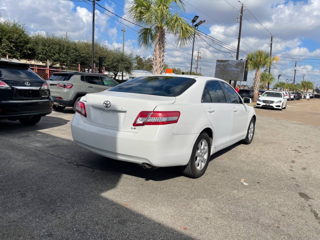 2011 Toyota Camry for sale at SMART CHOICE AUTO in Pasadena, TX