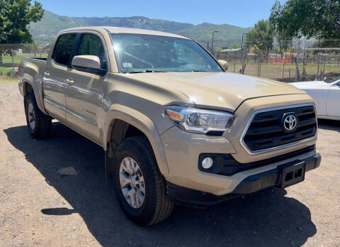 2017 Toyota Tacoma for sale at The Car-Mart in Bountiful UT