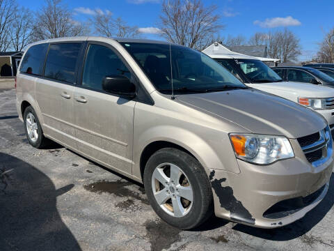 2013 Dodge Grand Caravan for sale at HEDGES USED CARS in Carleton MI