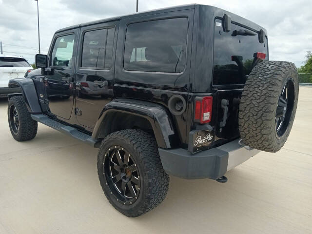 2014 Jeep Wrangler Unlimited for sale at Auto Haus Imports in Grand Prairie, TX