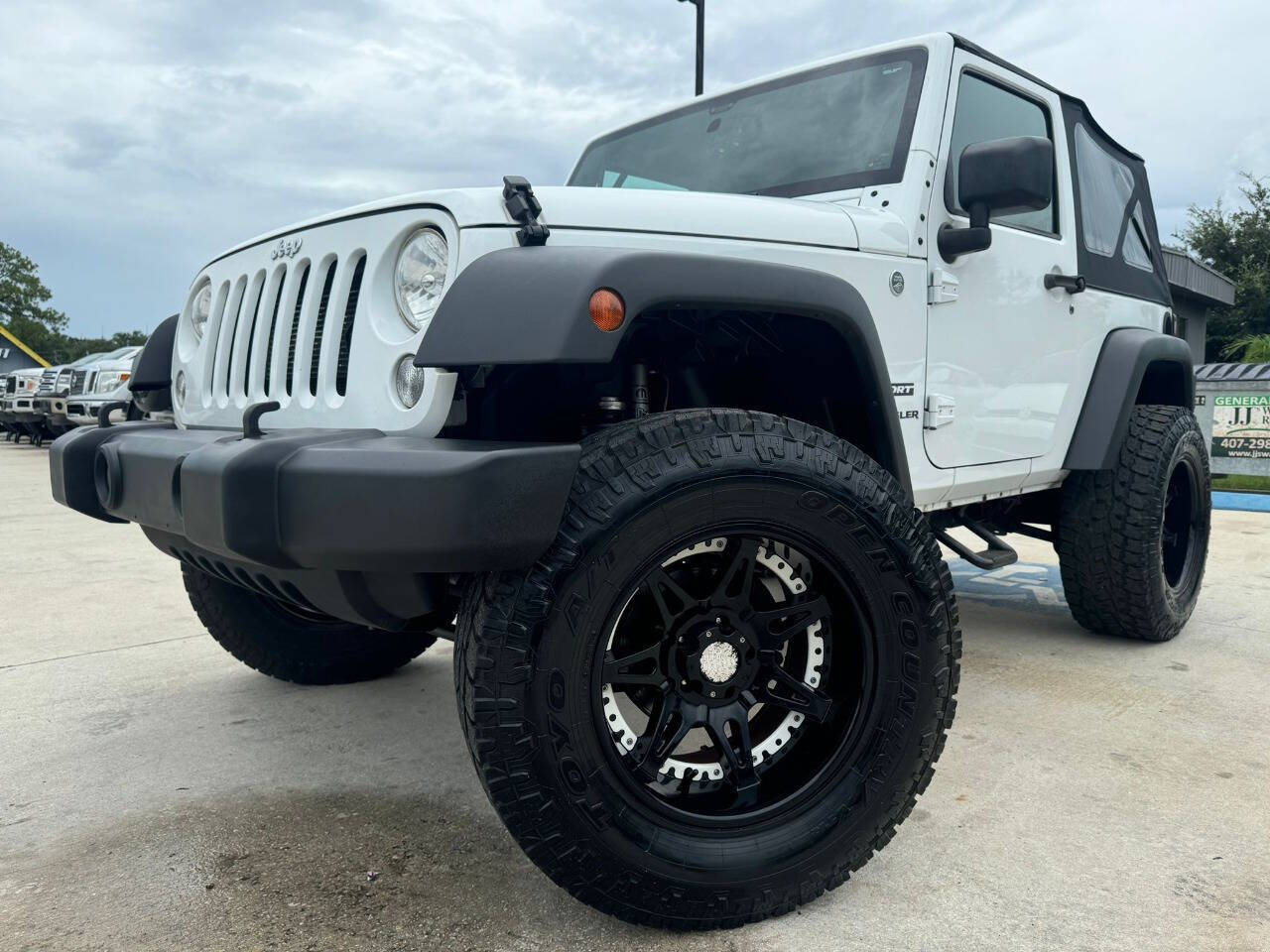 2014 Jeep Wrangler for sale at DJA Autos Center in Orlando, FL