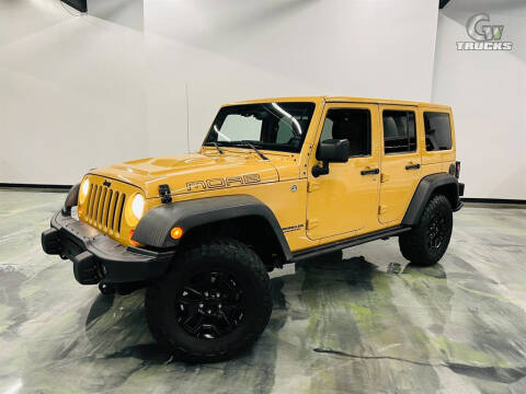 2013 Jeep Wrangler Unlimited for sale at GW Trucks in Jacksonville FL