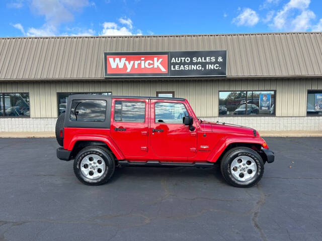 2014 Jeep Wrangler Unlimited for sale at Wyrick Auto Sales & Leasing Inc in Holland, MI