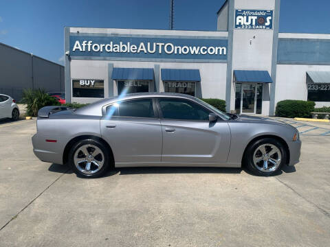 2014 Dodge Charger for sale at Affordable Autos in Houma LA