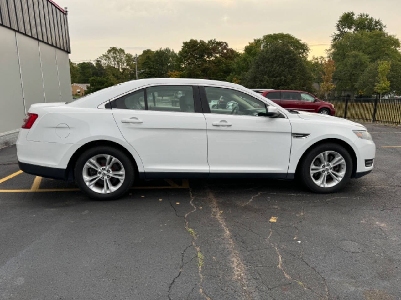 2014 Ford Taurus for sale at Carventure in Lansing, MI